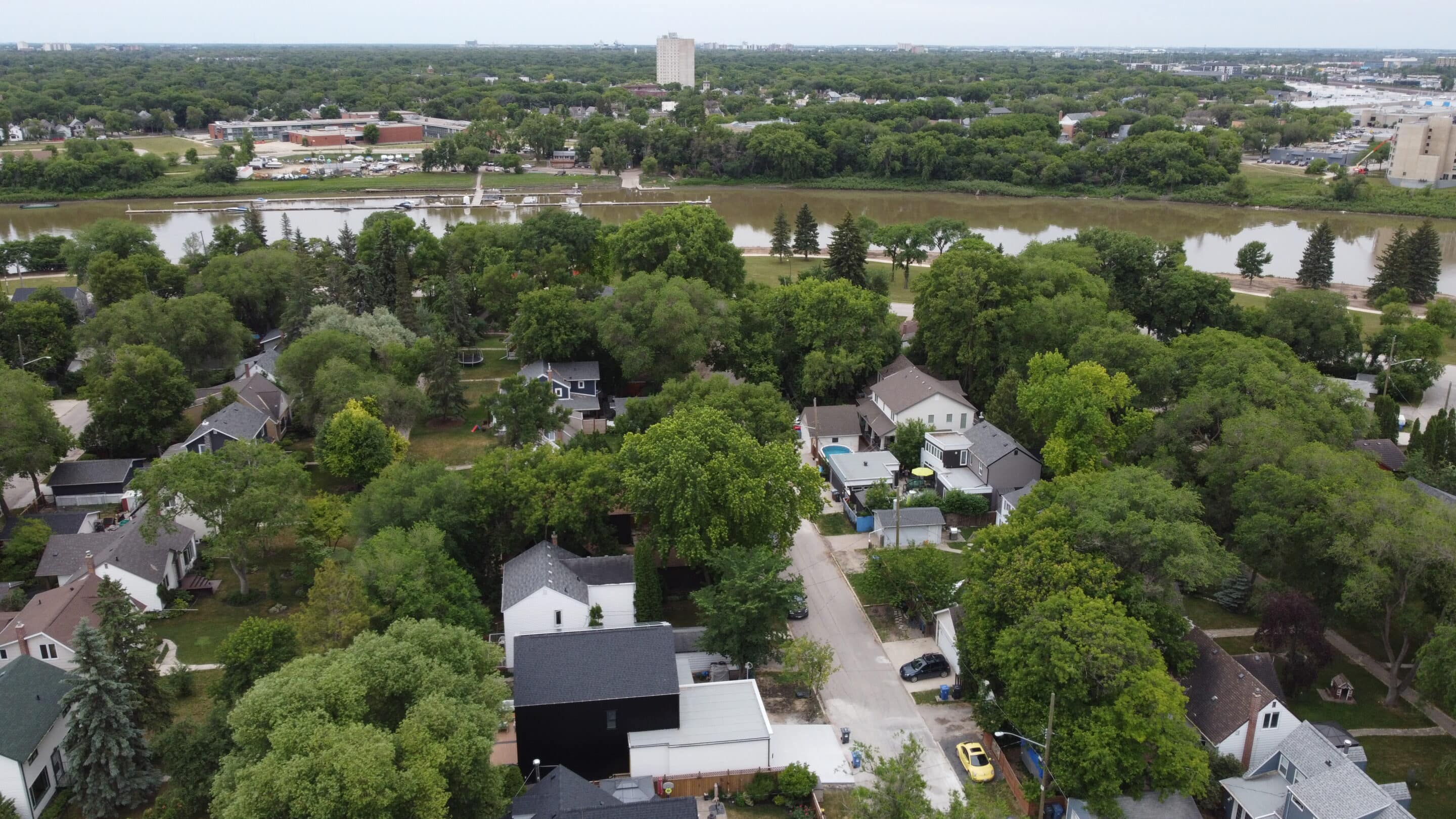 Aerial view of a Dueck Builders home in summer